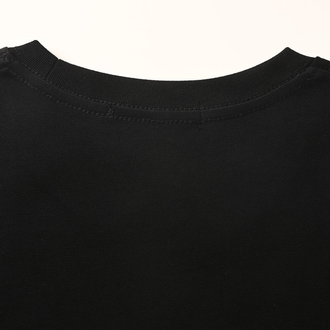 PRADA T-shirt with small figure graphic at the neckline